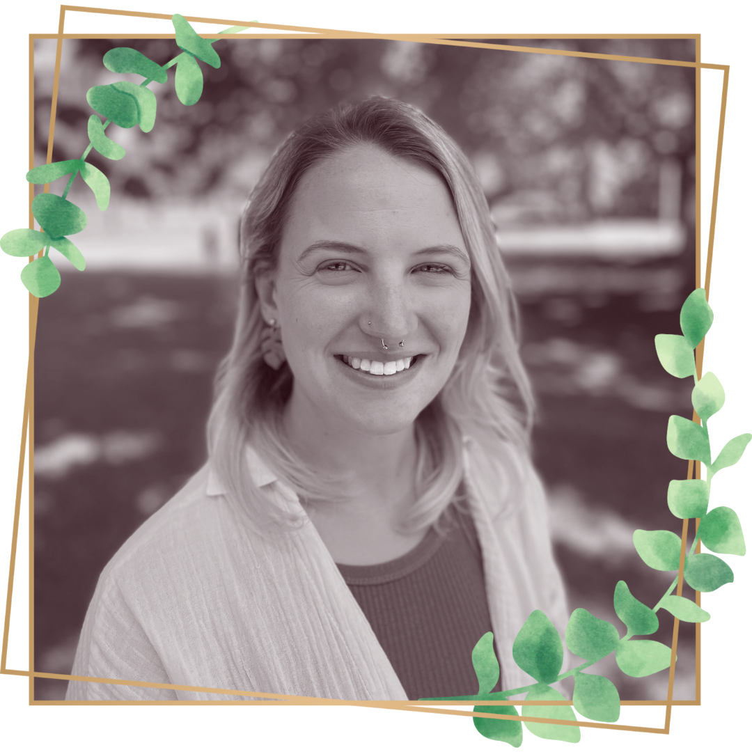 A photo of a smiling woman (Katie) in sepia tones